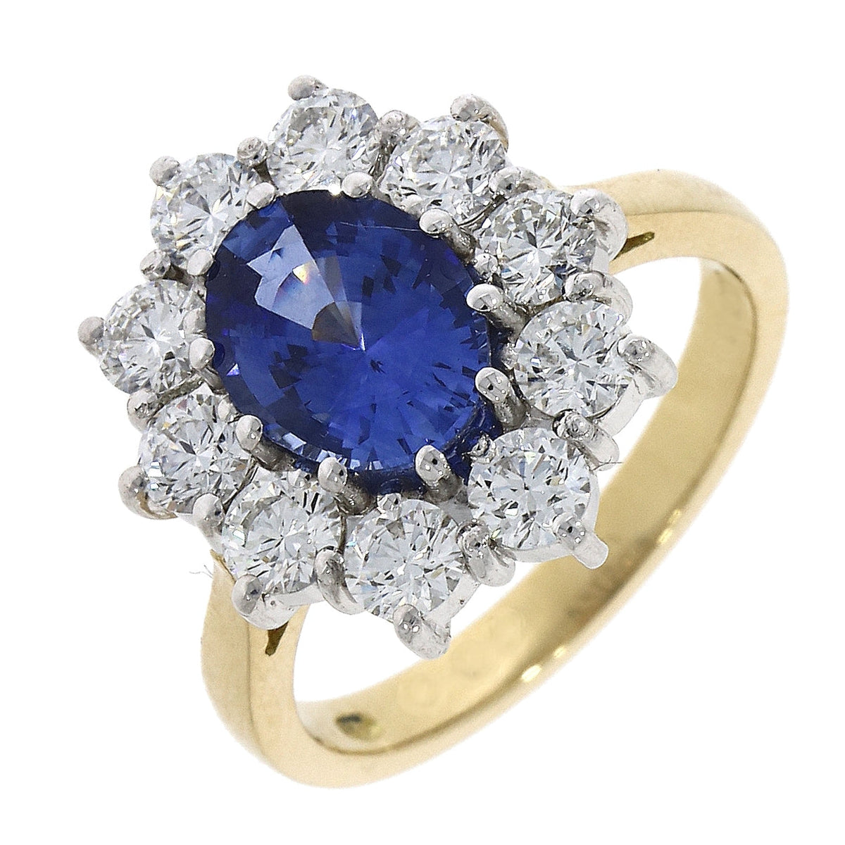 18ct Yellow gold and White Gold Claw set Oval Sapphire and Diamond ring